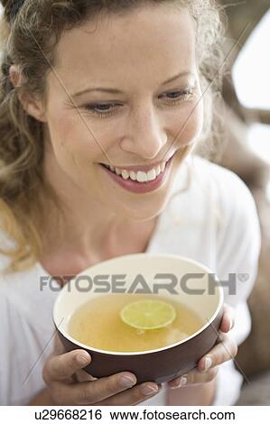 middle-aged woman drinking tea View Large Photo Image Stock Photograph - middle-aged woman drinking tea. Fotosearch