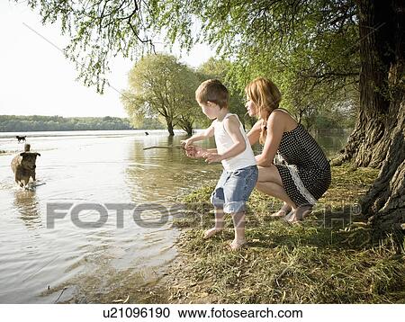 Mother and child and dogs View Large Photo Image Stock Image - Mother and child and dogs. Fotosearch
