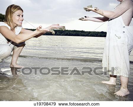 Mother and child dirty hands View Large Photo Image Stock Photo - Mother and child dirty hands. Fotosearch
