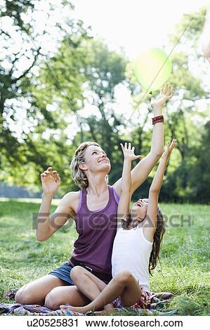 mother and daughter playing View Large Photo Image Stock Image - mother and daughter playing. Fotosearch