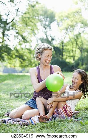 mother and daughter playing View Large Photo Image Stock Photo - mother and daughter playing. Fotosearch