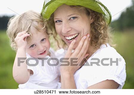 Stock Image - mother and little child. Fotosearch