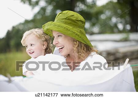 Stock Photo - mother and little child. Fotosearch