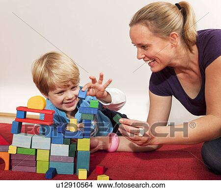 mother and son play with building blocks View Large Photo Image Picture - mother and son play with building blocks. Fotosearch