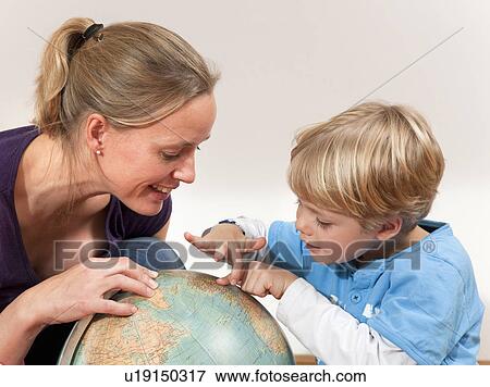 mother and son study globe View Large Photo Image Stock Photo - mother and son study globe. Fotosearch