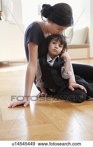 mother caressing son View Large Photo Image Stock Photo - mother caressing son. Fotosearch