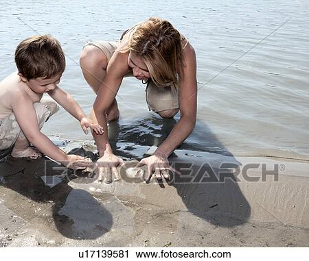 Mother demonstrating to Child View Large Photo Image Stock Image - Mother demonstrating to Child. Fotosearch