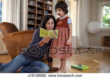 mother reading to daughter View Large Photo Image Stock Image - mother reading to daughter. Fotosearch