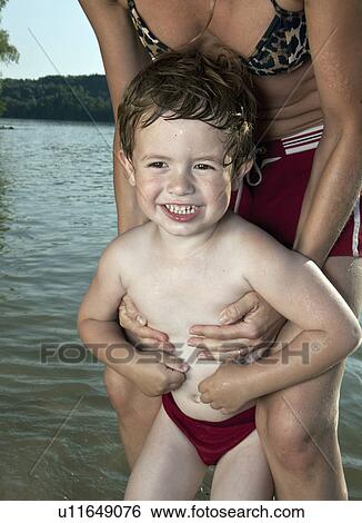 mothers hands holding child View Large Photo Image Stock Photograph - mothers hands holding child. Fotosearch