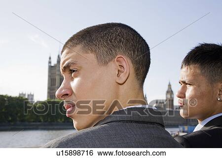 Multi cultural Teenagers in suits View Large Photo Image Stock Photograph - Multi cultural Teenagers in suits. Fotosearch