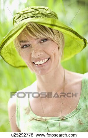 Stock Photo - outdoor portrait of a woman. Fotosearch