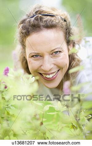 outdoor portrait of middle-aged woman View Large Photo Image Stock Photo - outdoor portrait of middle-aged woman. Fotosearch
