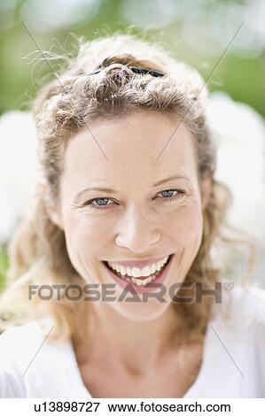 outdoor portrait of middle-aged woman View Large Photo Image Stock Photo - outdoor portrait of middle-aged woman. Fotosearch