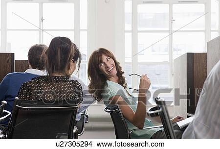 Picture - People at work at workstations. Fotosearch