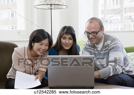 Stock Photography - People working at casual office. Fotosearch