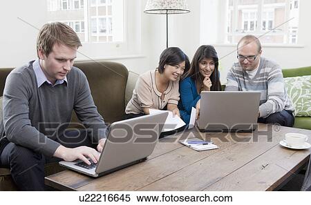 People working at casual office View Large Photo Image Stock Photography - People working at casual office. Fotosearch
