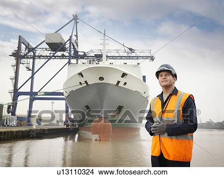 Port Worker And Container Ship View Large Photo Image Picture - Port Worker And Container Ship. Fotosearch