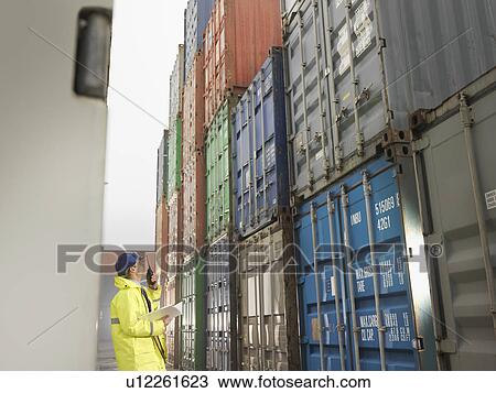 Port Worker With Shipping Container View Large Photo Image Stock Image - Port Worker With Shipping Container. Fotosearch