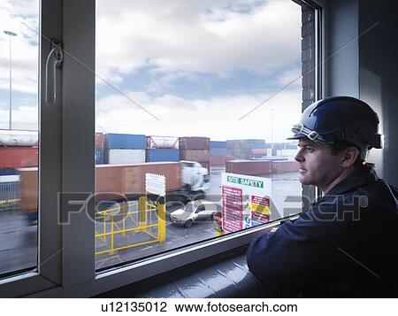 Port Worker With Shipping Containers View Large Photo Image Stock Image - Port Worker With Shipping Containers. Fotosearch