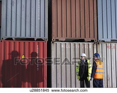 Port Workers With Shipping Containers View Large Photo Image Stock Photography - Port Workers With Shipping Containers. Fotosearch