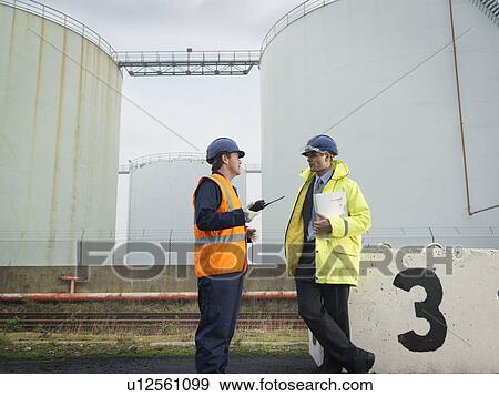 Port Workers With Walkie Talkie View Large Photo Image Stock Photo - Port Workers With Walkie Talkie. Fotosearch
