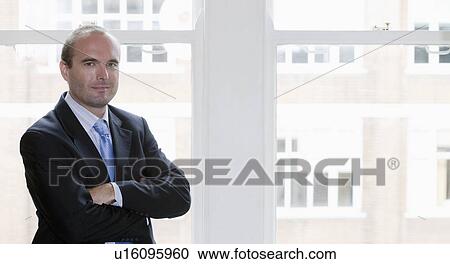 Stock Image - Portrait of a Businessman.. Fotosearch