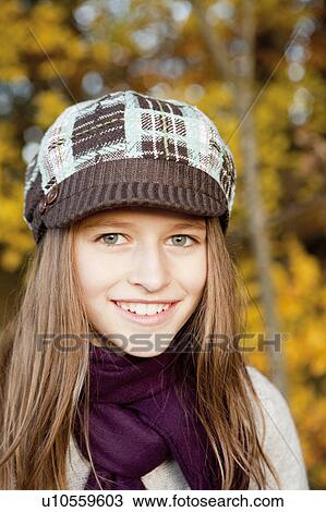Portrait of a girl with cap View Large Photo Image Stock Image - Portrait of a girl with cap. Fotosearch