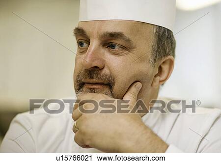 Stock Image - Portrait of a male head chef. Fotosearch