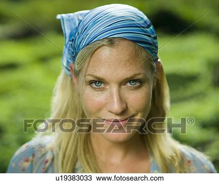 Stock Image - Portrait of a smiling woman. Fotosearch