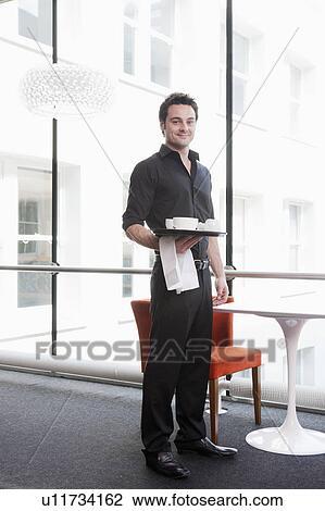 Stock Image - Portrait of a Waiter. Fotosearch