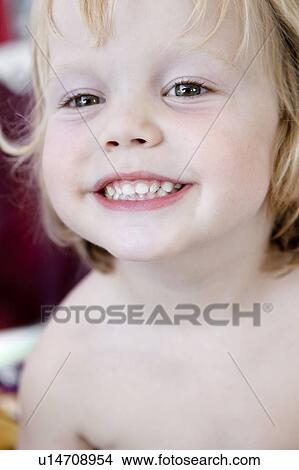 Picture - Portrait of boy grinning. Fotosearch
