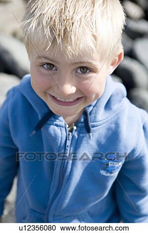Portrait of boy grinning View Large Photo Image Stock Image - Portrait of boy grinning. Fotosearch
