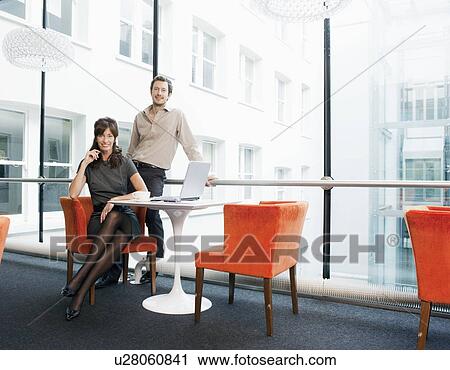 Stock Image - Portrait of Business couple. Fotosearch