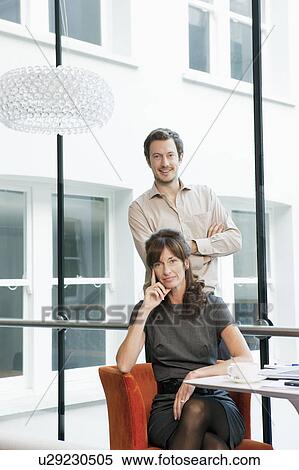 Stock Photography - Portrait of Business couple. Fotosearch
