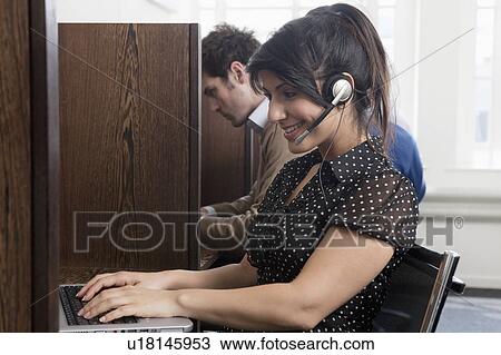 Portrait of call a call center operator View Large Photo Image Stock Image - Portrait of call a call center operator. Fotosearch