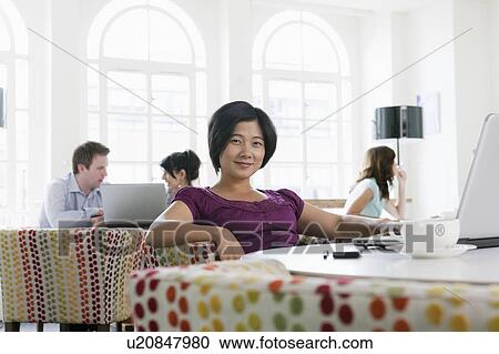 Portrait of female Vietnamese, in office View Large Photo Image Stock Image - Portrait of female Vietnamese, in office. Fotosearch