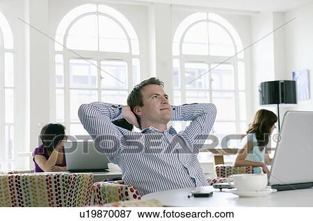 Portrait of male with laptop View Large Photo Image Stock Photo - Portrait of male with laptop. Fotosearch