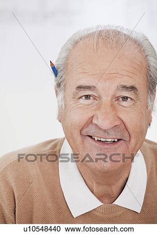 Stock Image - Portrait of senior businessman. Fotosearch
