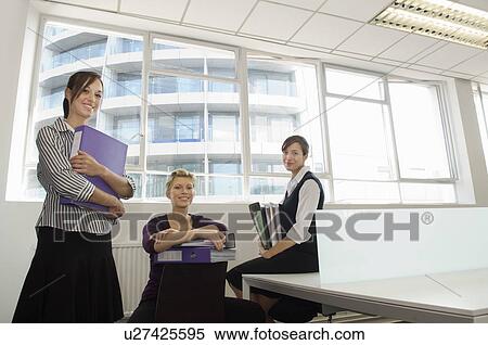Portrait of three office girls. View Large Photo Image Stock Photography - Portrait of three office girls.. Fotosearch