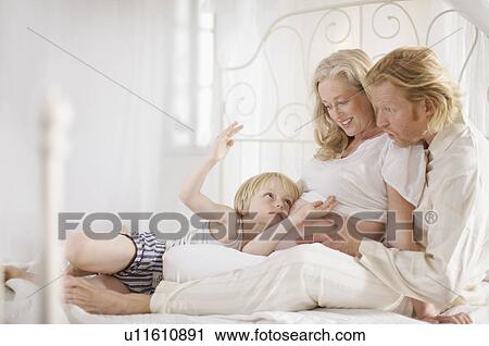 pregnant woman and family View Large Photo Image Stock Image - pregnant woman and family. Fotosearch