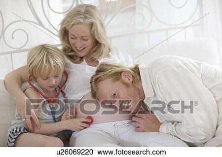 pregnant woman and family View Large Photo Image Stock Image - pregnant woman and family. Fotosearch