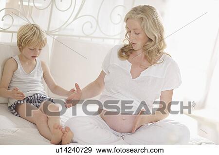 pregnant woman and family View Large Photo Image Stock Photo - pregnant woman and family. Fotosearch