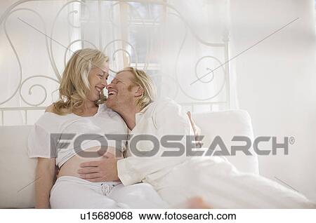 pregnant woman and family View Large Photo Image Stock Photo - pregnant woman and family. Fotosearch