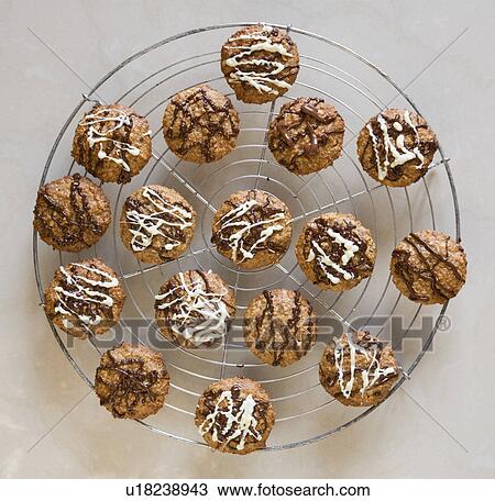 Stock Image - round, brown christmas cookies. Fotosearch