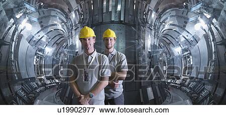 Scientists Working In A Fusion Reactor View Large Photo Image Stock Photo - Scientists Working In A Fusion Reactor. Fotosearch