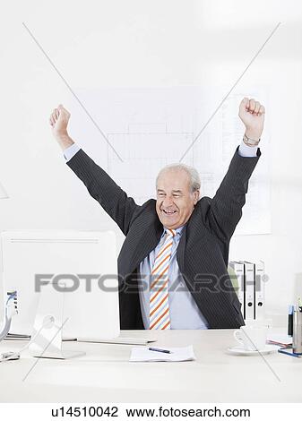 Stock Image - Senior businessman jubilating. Fotosearch