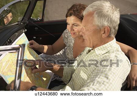 senior couple with car and map View Large Photo Image Stock Image - senior couple with car and map. Fotosearch