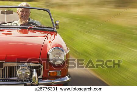 Senior man in sports car View Large Photo Image Stock Image - Senior man in sports car. Fotosearch