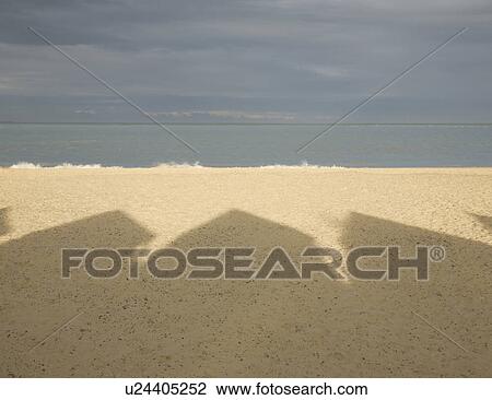 Shadow of beach huts View Large Photo Image Stock Image - Shadow of beach huts. Fotosearch