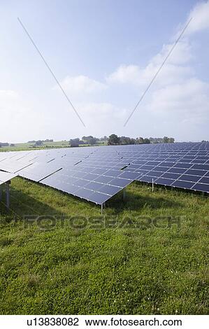 Stock Image - Solar panels on a meadow. Fotosearch